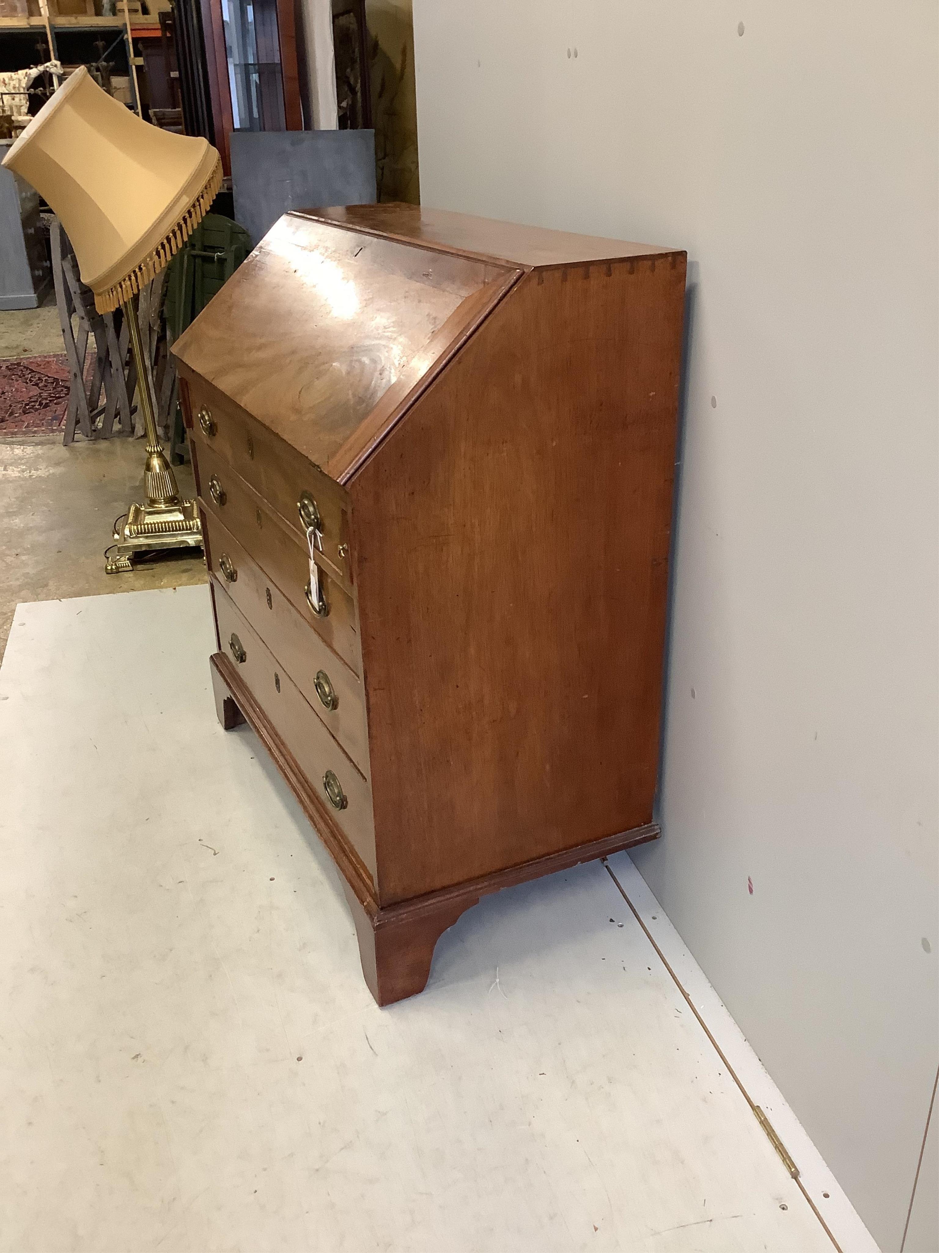 A George III mahogany bureau, width 98cm, depth 52cm, height 107cm. Condition - poor to fair